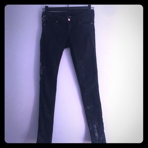 Black skinny low-rise jeans w white paint splatter